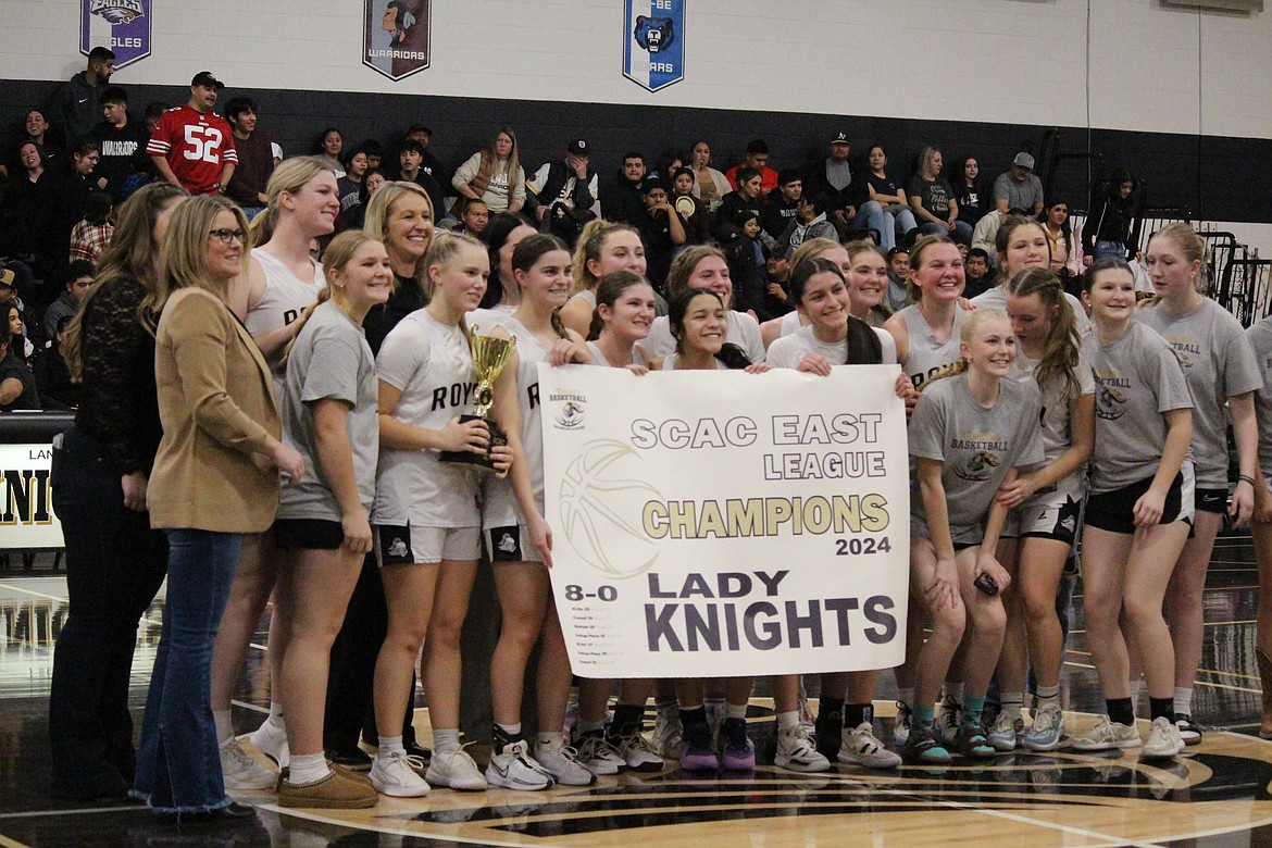 The league champion Royal Knights celebrate their title. Coach Farrah Wardenaar said it was the first time Royal won a league championship since 1988.