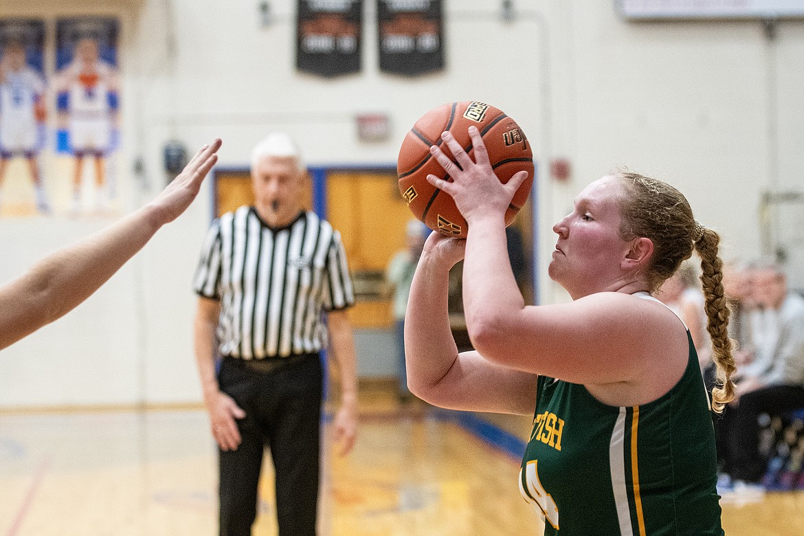 Bulldog Ainsley Scott tries for a three-pointer playing the Wildkats Tuesday, Jan. 30. (Avery Howe photo)