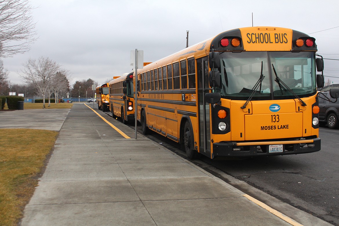 Buses line up outside Frontier Middle School before the end of the school day. Bullying and harassment present challenges at Frontier, as well as other schools. During an incident in December of 2021 a 13-year-old was reportedly assaulted in front of the bus line while picking up her sibling from the campus. That led to the girl visiting the emergency room for treatment.