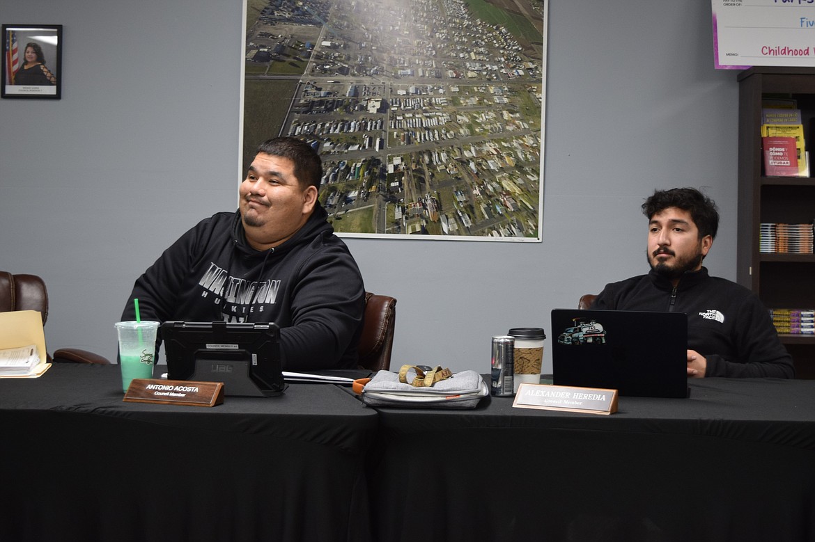 Mattawa City Council members Antonio Acosta, left, and Alexander Heredia, right, discuss council matters during a regular meeting in January. Acosta expressed concern with a section of new truck regulations allowing unloaded trucks on residential and arterial streets, which the council voted to strike from the new amendments.