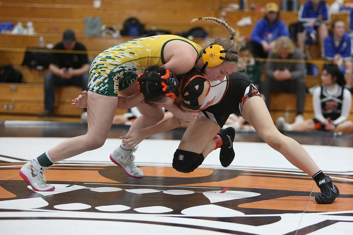 Quincy junior Harlie Torgeson, left, wrestles against Ephrata senior Maribel Tejeda, right, at Saturday’s 2A/1A/B District 6 Sub-Regional at Ephrata.