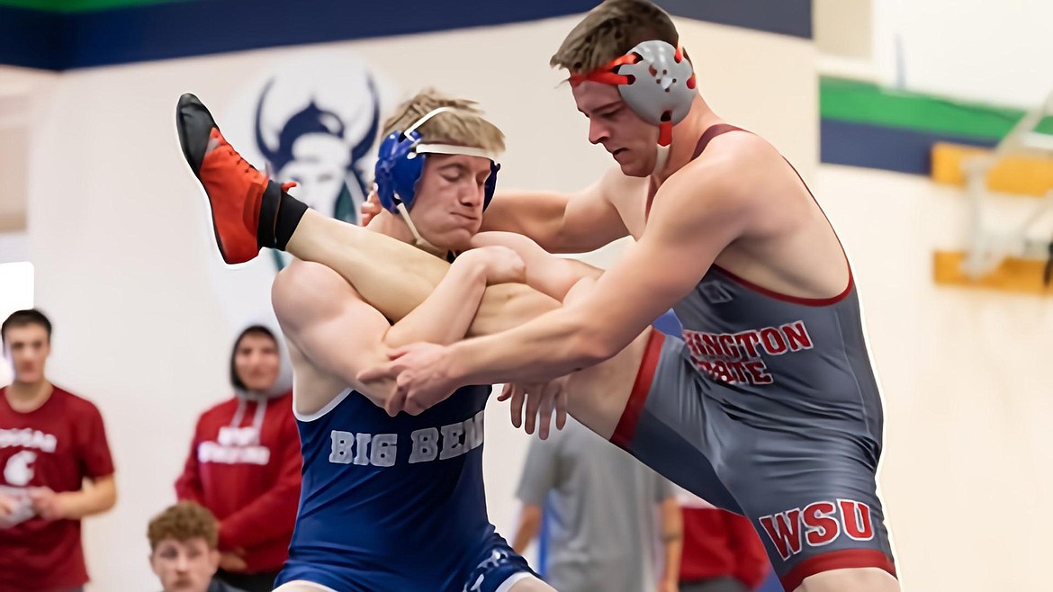 A Big Bend Community College wrestler takes on a WSU competitor.