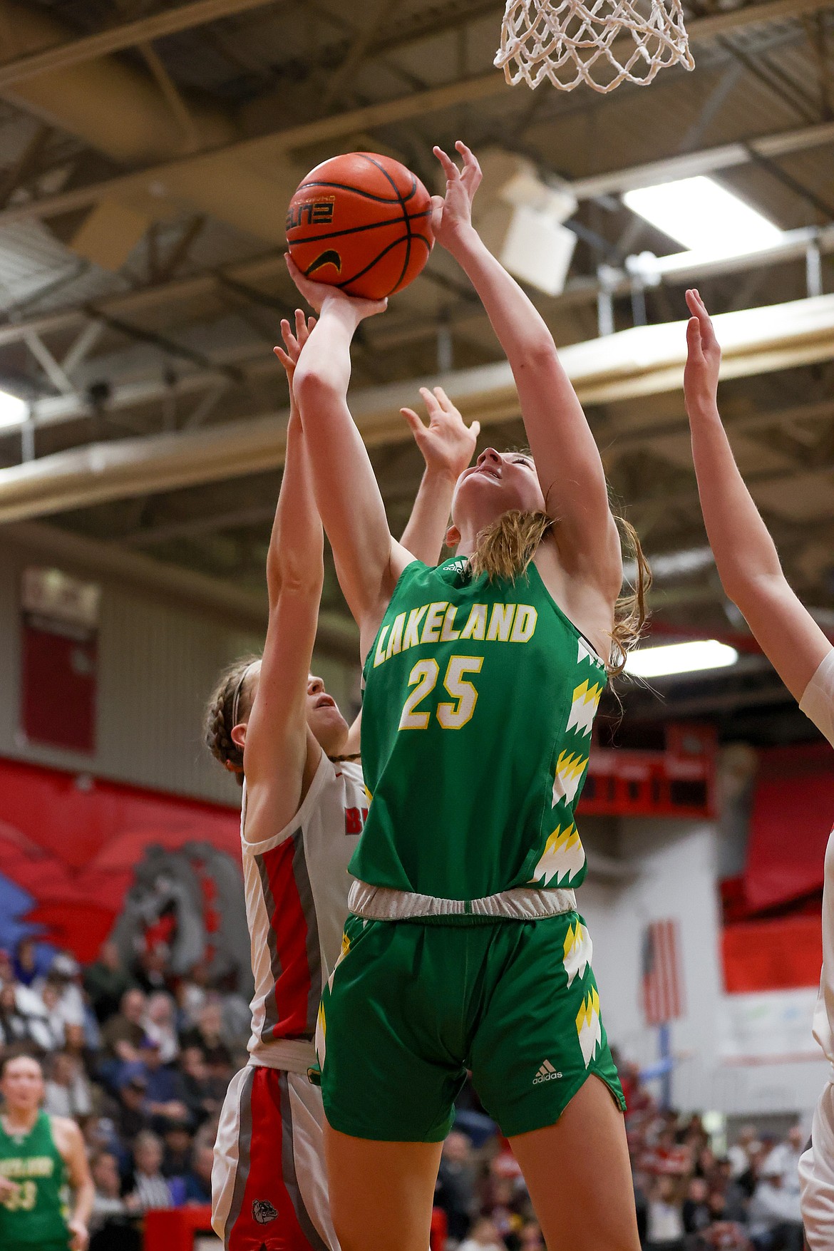 JASON DUCHOW PHOTOGRAPHY
Lakeland freshman Macy Bretveld (25) goes up for a shot against Sandpoint on Thursday night in Sandpoint.