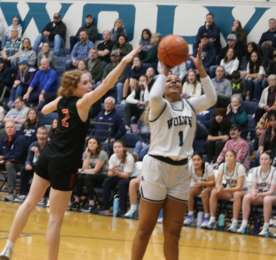 JASON ELLIOTT/Press
Lake City senior KaLiah Frazey drives past Post Falls senior Kinlee McLean for a basket in the third quarter of Thursday's 5A Region 1 girls basketball second place game at Lake City High.