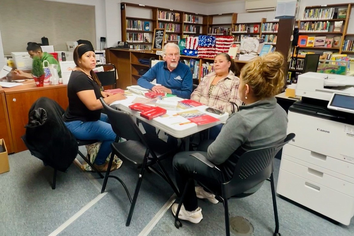 Students of Peshastin Public Libary’s citizenship classes work with Hand In Hand immigration services volunteers to prepare for the Naturalization Interview and Test. NCW Libraries Latinx Services Manager Claudia Bovee said the Peshastin program has already seen several people become US citizens.