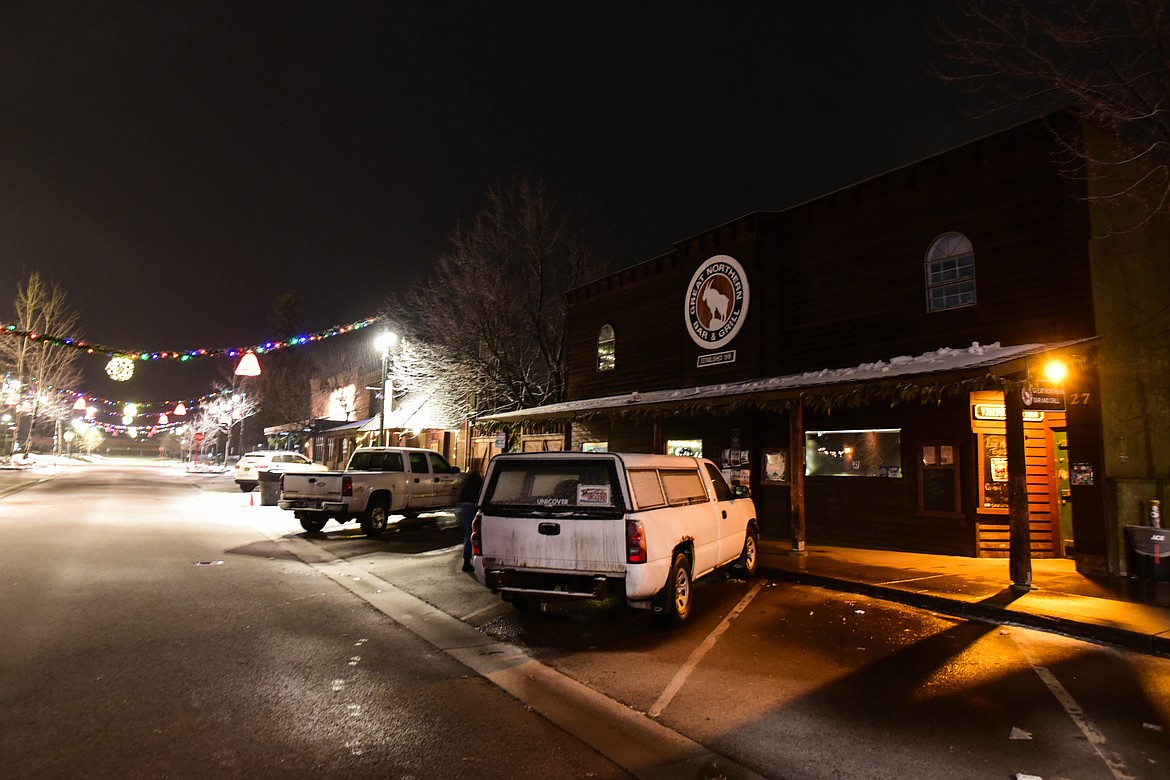 The Great Northern Bar is empty, except for the presence of a few cars, during the early hours of Feb. 4, 2024. (Kate Heston/Daily Inter Lake)