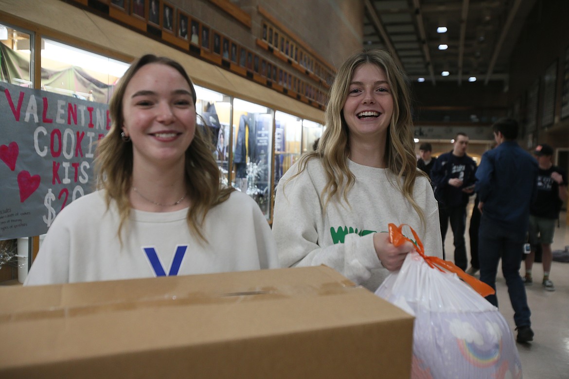 Coeur d'Alene High School senior and ASB President Andi Jane Howard, left, and CHS senior and ASB secretary Jenny Elliott are at Lake City High on Friday as they prepare to deliver collected items to local nonprofits with peers from both schools. The collections and distribution were done as part of the 2024 All for Awl campaign.