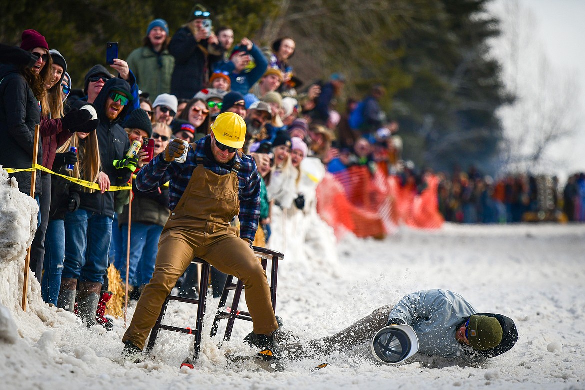 Participants race down Sugar Hill during the Barstool Ski Races at Cabin Fever Days in Martin City on Saturday, Feb. 10. (Casey Kreider/Daily Inter Lake)