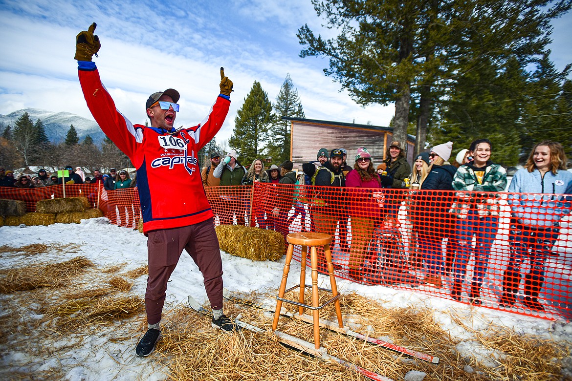 A participant celebrates after a win during the Barstool Ski Races at Cabin Fever Days in Martin City on Saturday, Feb. 10. (Casey Kreider/Daily Inter Lake)