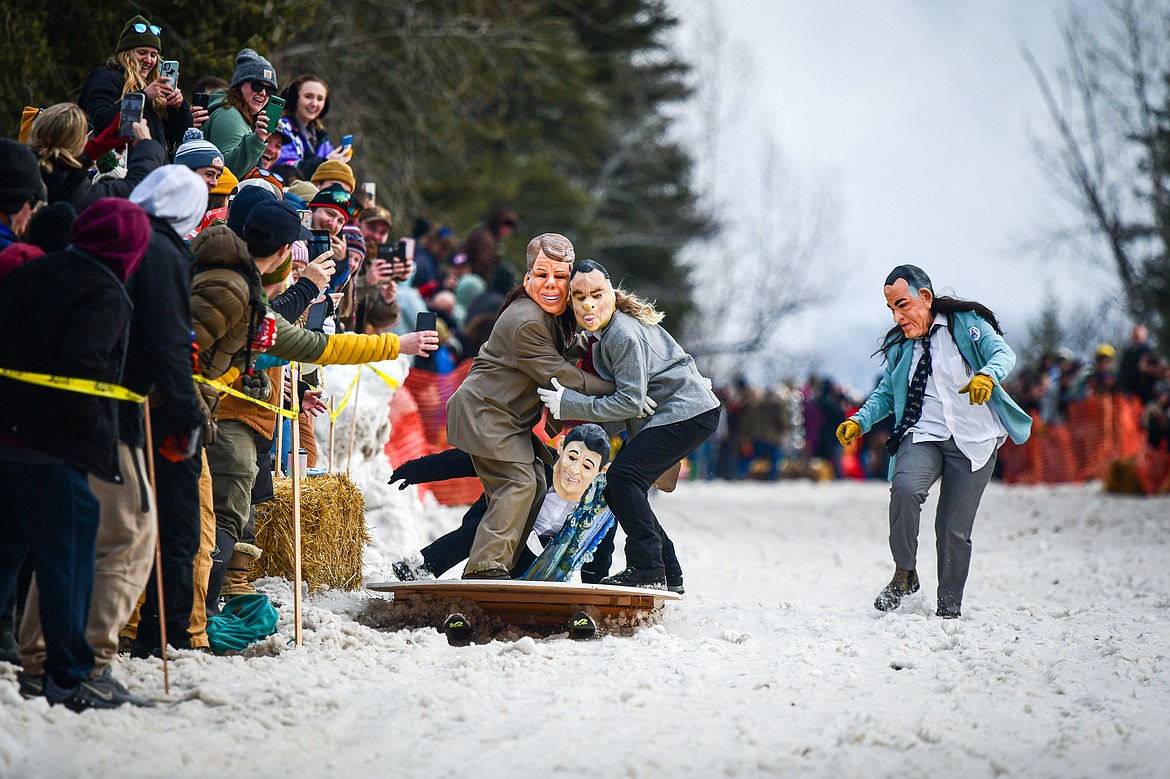 Participants race down Sugar Hill during the Barstool Ski Races at Cabin Fever Days in Martin City on Saturday, Feb. 10. (Casey Kreider/Daily Inter Lake)