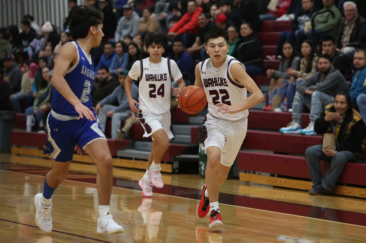 Wahluke junior River Buck, right, scored 31 points in Thursday’s South Central Athletic Conference district tournament game against La Salle on Thursday.