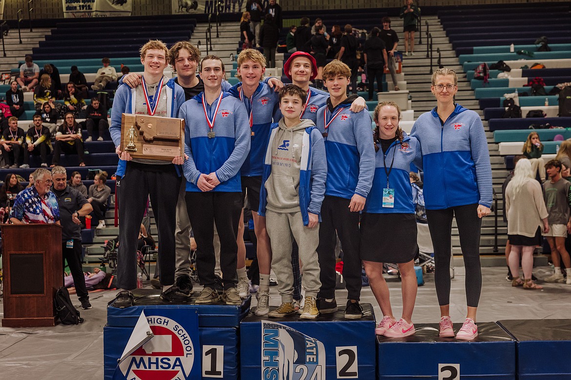 THE COLUMBIA FALLS boys pose with their third-place trophy. (Photo by Matt Ehnes of Jared’s Detours)