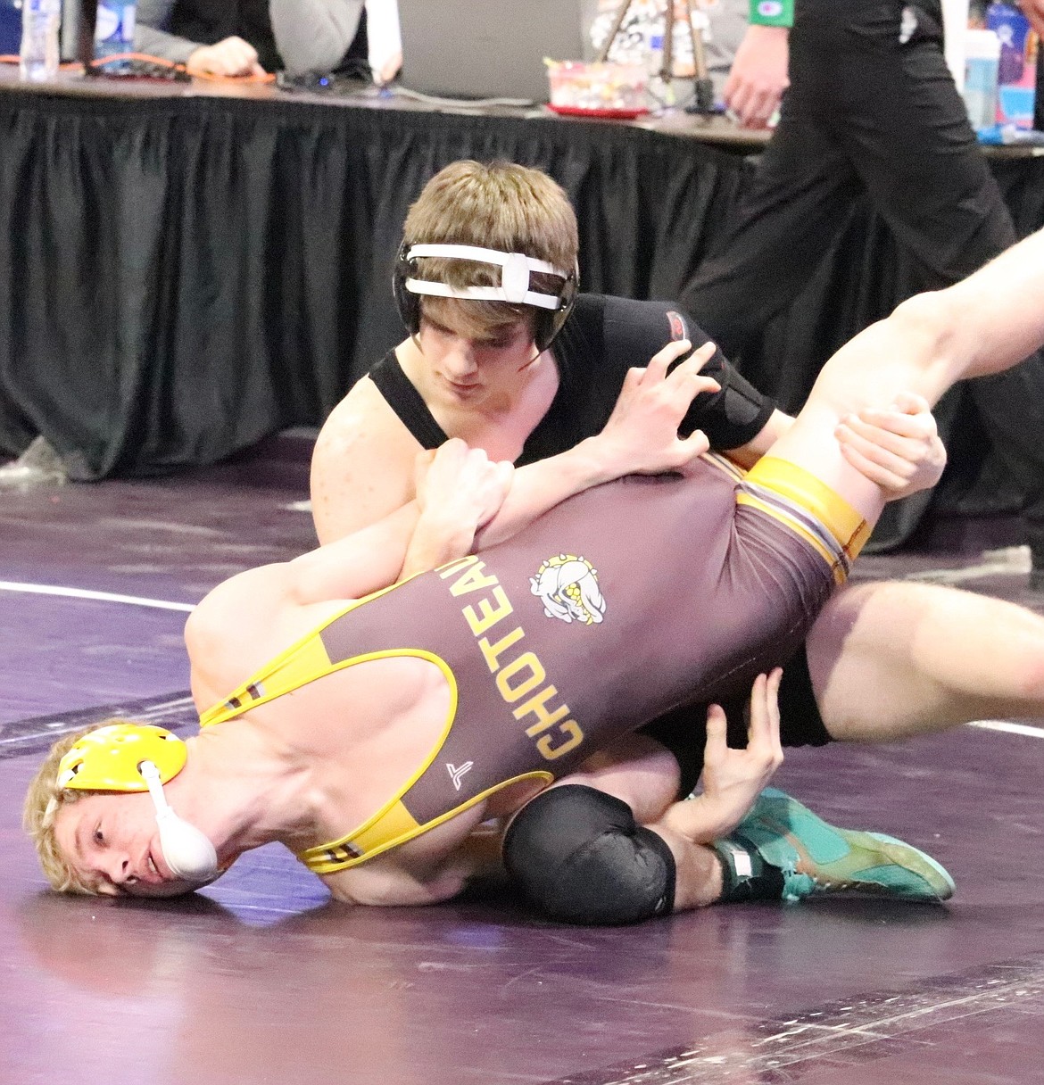 Plains junior 152 pounder John Waterbury takes control of his Choteau opponent during this year's B-C state wrestling championship in Billings.  Waterbury finished fourth.(Photo by Kami Milender)