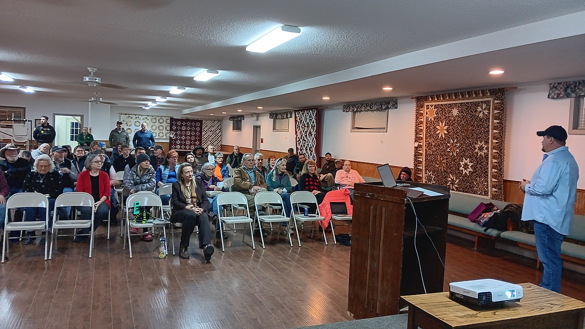 Drew Hanson speaks to Mineral County Chamber of Commerce members before the election at the St. Regis Community Center last Wednesday. He thanked everyone for being supportive and engaged during the reorganization and to please continue the positive momentum that has awakened. (Monte Turner/Mineral Indepedent)