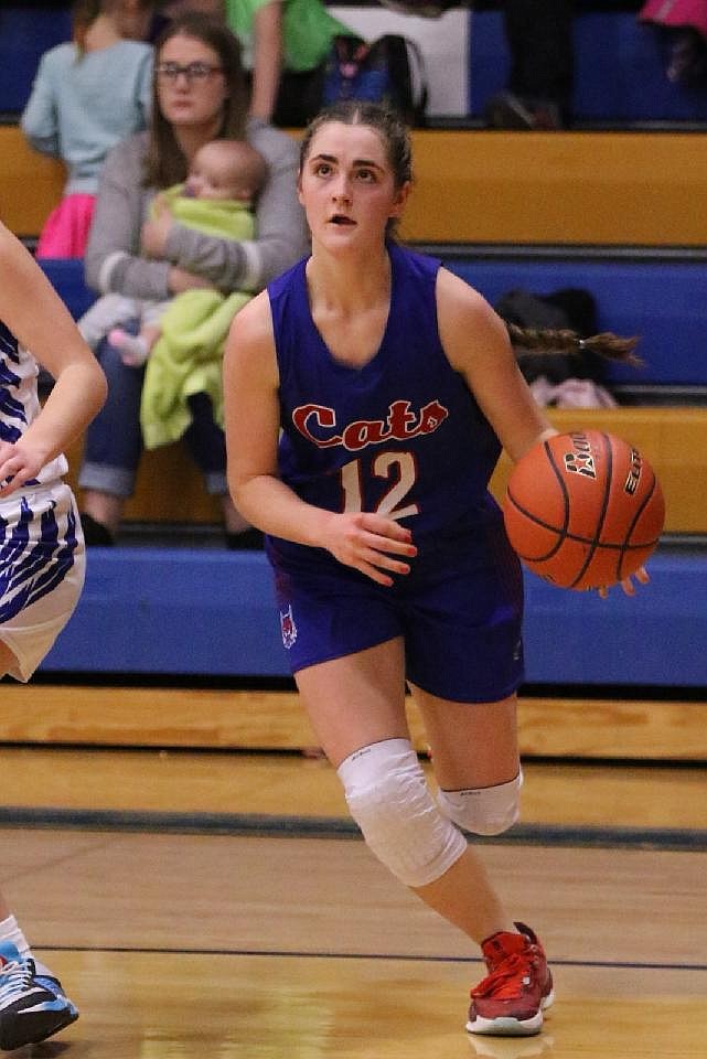 Superior freshman guard Josie Crabb, who had 18 points to lead all game scorers drives for two during the Lady Bobcats game with Thompson Falls Saturday night.  (Photo by Byron Quinlan)