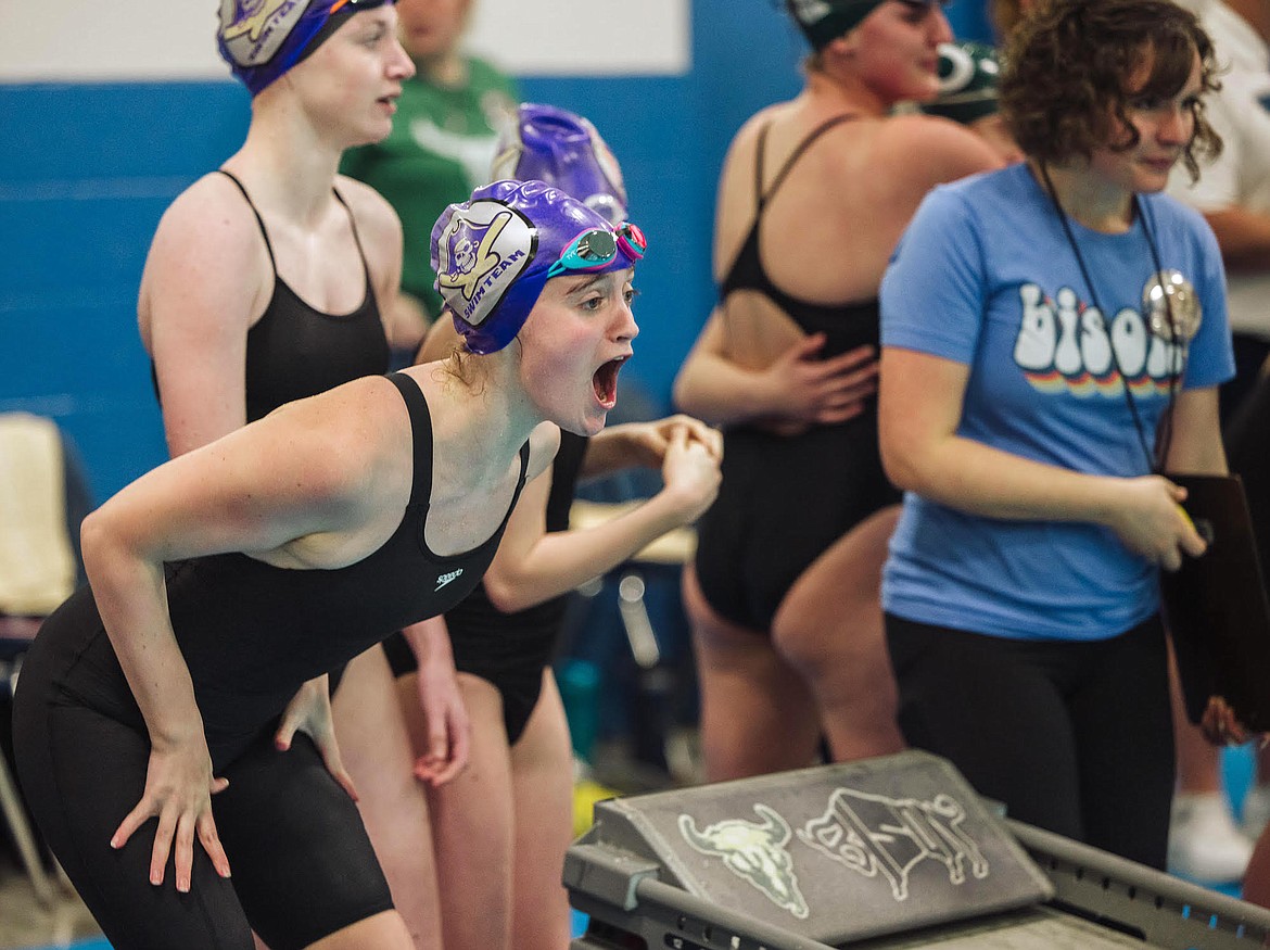 Polson swimmer Dixie Montgomery cheers on her teammates in the 400-yard relay. Polson took second in the event during last week's state swim tourney. (Photo by Matt Ehnes, jaredsdetours.com/havasupai-waterfalls/)