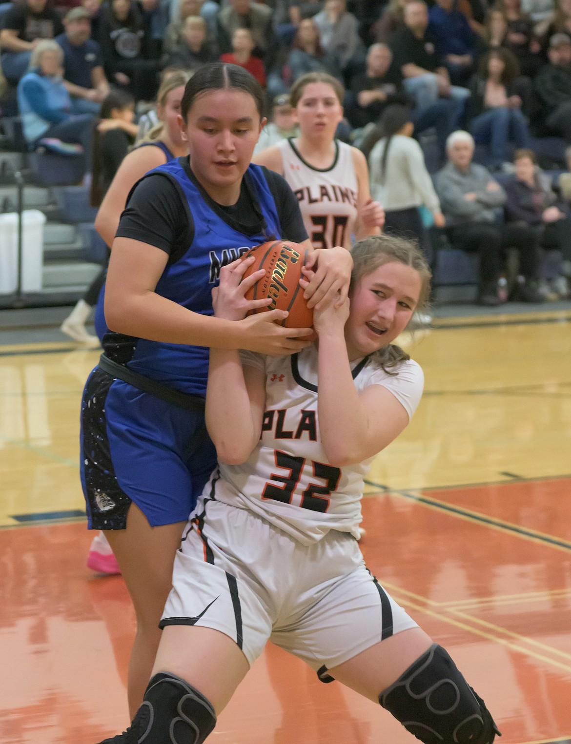 Trotters freshman Claire Lakko fights to control the ball during Plains' game against league leading Mission girls Saturday night in Plains.  (Tracy Scott photo)