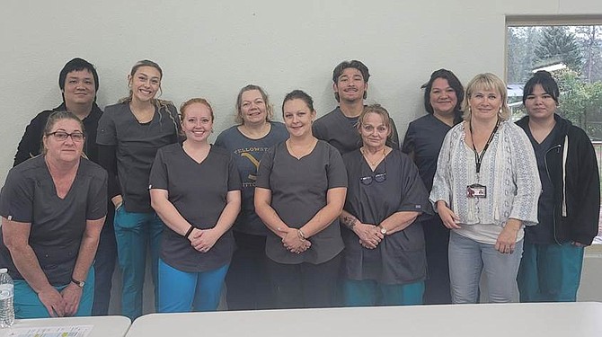 CNAs in the Silver Valley celebrate completing their CNA training through North Idaho College in fall 2023. Pictured from left: Ronni Barney, Matthew Dahlberg, Pauletta Frost, Mariah Hanks, Ivey Jones, Vitani Jones, Louis Powell, Corinne Smith and Emma Van Hoose.