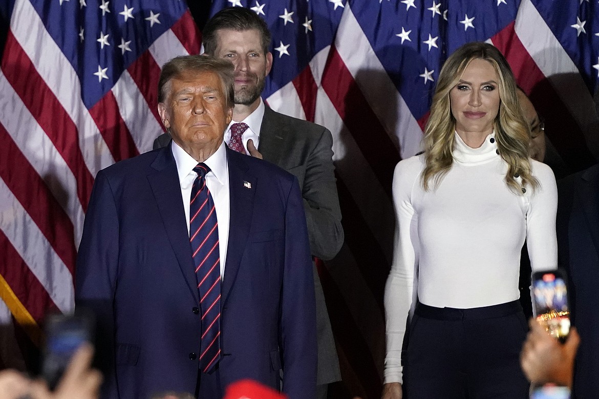 Republican presidential candidate former President Donald Trump arrives to speak at a primary election night party in Nashua, N.H., Tuesday, Jan. 23, 2024, with Eric and Lara Trump. Trump is calling for a leadership change at the Republican National Committee in an attempt to install a new slate of loyalists — including his daughter-in-law — at the top of the GOP’s political machine even before he formally secures the party’s next presidential nomination. T(AP Photo/Pablo Martinez Monsivais, File)