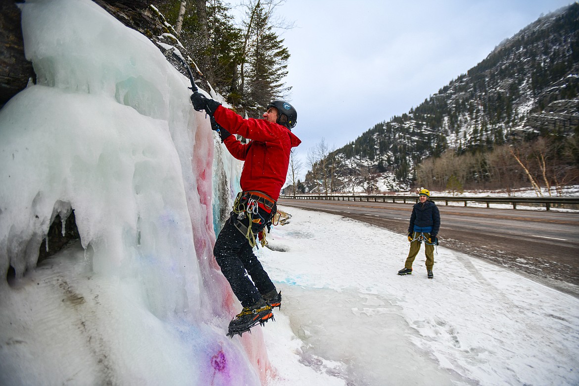 Dave Parker and Jeff Birchfield climb the ice in Bad Rock Canyon on Saturday, Feb. 10. (Casey Kreider/Daily Inter Lake)