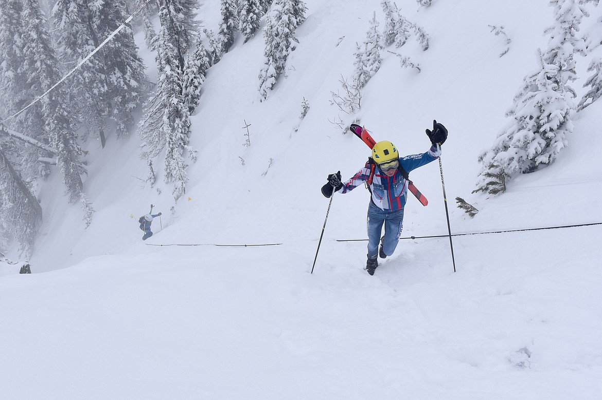 Ian Clark emerges from the NBC bootpack at Whitefish Mountain Resort during the annual Whitefish Whiteout skimo race on Saturday, Feb. 10, 2024. (Matt Baldwin/Whitefish Pilot)