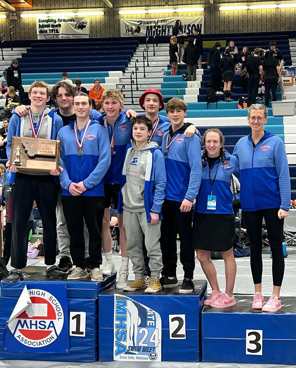 Left to right; Connor Keith, Zackary Pierce, Thane Borgen, Quinn Clark, Teagan Bates, Jackson Schubert, Tristan Victor, Head Coach Amy Caudill and Assistant Coach, Aven Middlesworth at the state tournament this weekend. (Courtesy photo)