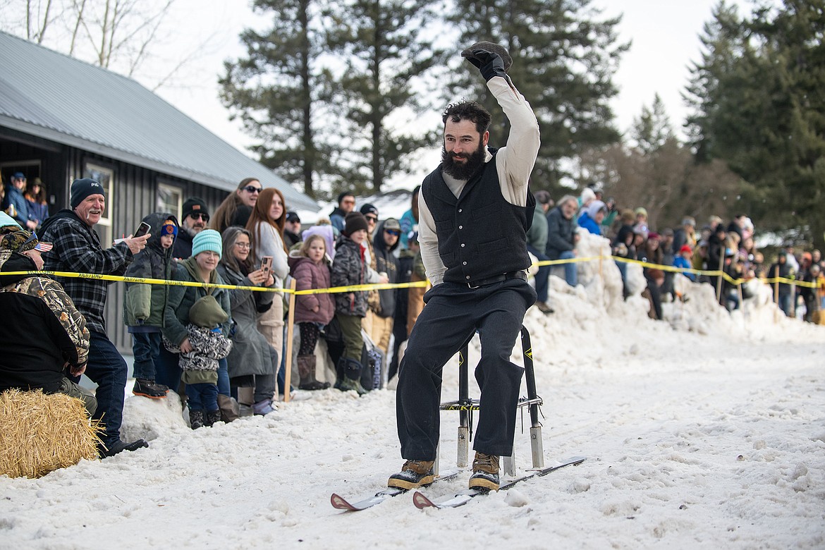 Bar stool ski racers make their way down Sugar Hill in Martin City for Cabin Fever Days Saturday, Feb. 10. Fifty-six racers participated, and an estimated $10,000-plus was raised for Badrock Canyon first responders. (Avery Howe photo)