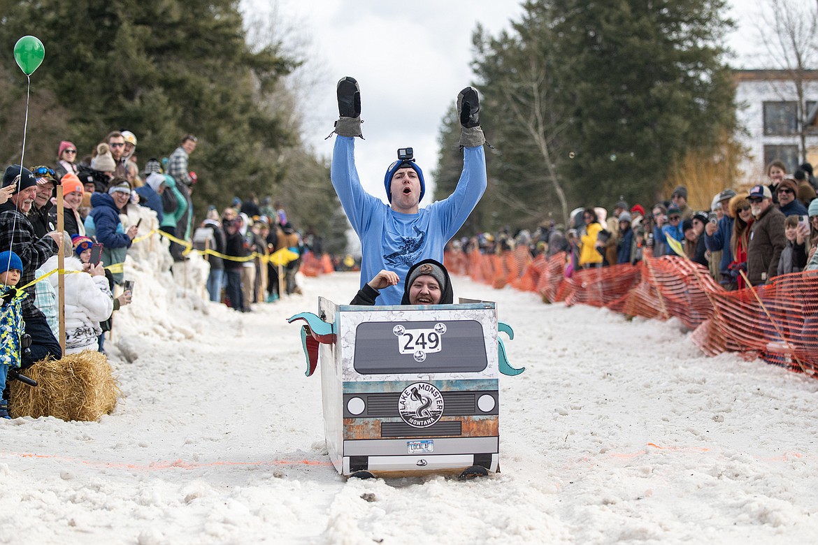 Bar stool ski racers make their way down Sugar Hill in Martin City for Cabin Fever Days Saturday, Feb. 10. Fifty-six racers participated, and an estimated $10,000-plus was raised for Badrock Canyon first responders. (Avery Howe photo)