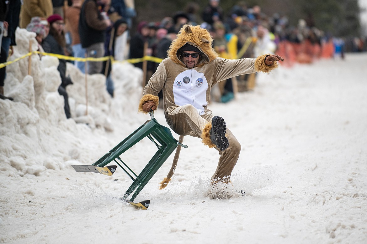 Bar stool ski racers make their way down Sugar Hill in Martin City for Cabin Fever Days Saturday, Feb. 10. Fifty-six racers participated, and an estimated $10,000-plus was raised for Badrock Canyon first responders. (Avery Howe photo)