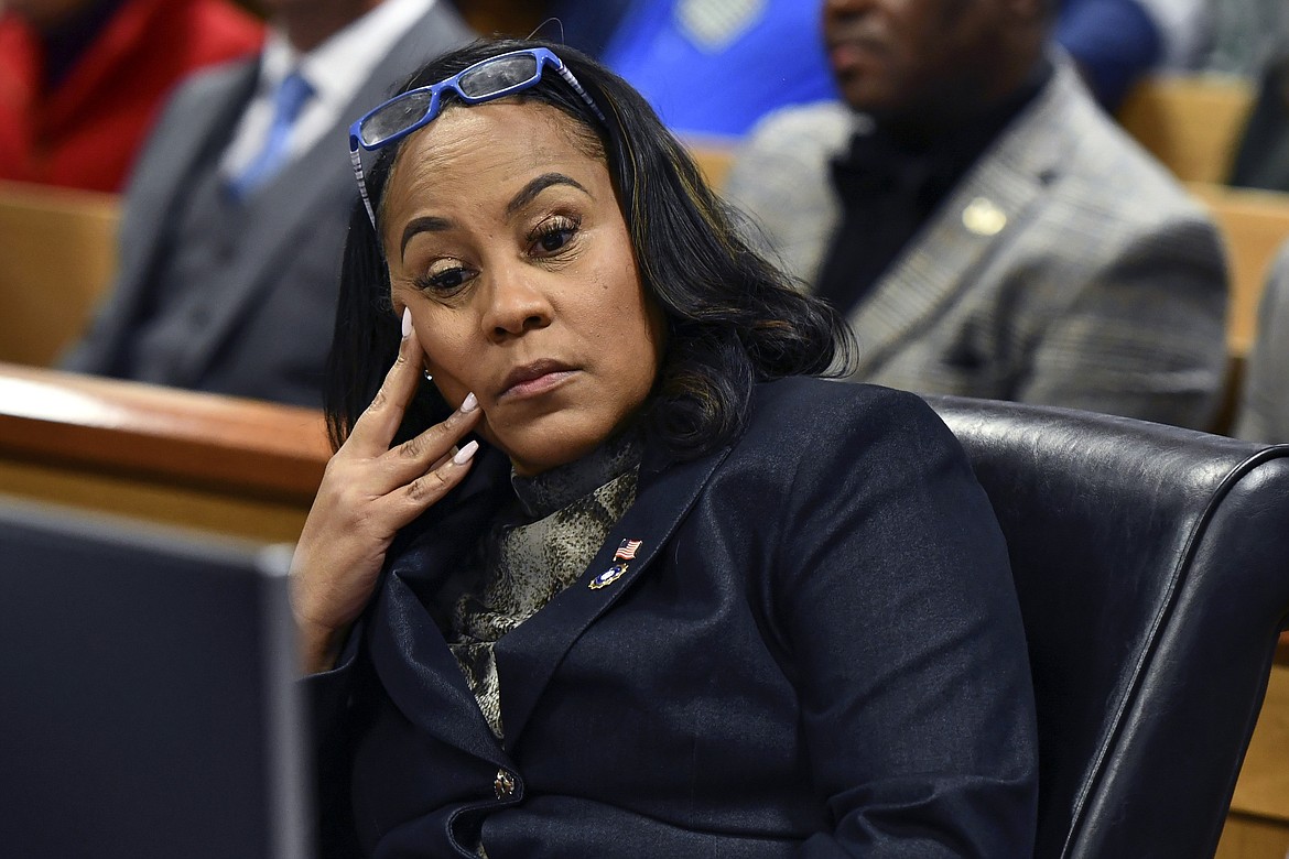 Fulton County District Attorney Fani Willis appears during a hearing regarding defendant Harrison Floyd, a leader in the organization Black Voices for Trump, as part of the Georgia election indictments, Nov. 21, 2023, in Atlanta. A Georgia judge who is deciding whether to toss Fulton County District Attorney Fani Willis off of her election interference case against former President Donald Trump has set a hearing for Thursday that is expected to focus on details of Willis' personal relationship with a special prosecutor she hired. (Dennis Byron/Hip Hop Enquirer via AP, File)