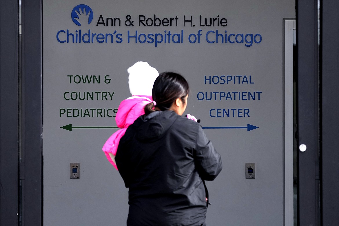 Lurie Children's Hospital sign is seen at the hospital as patients walk in, Feb. 5, 2024, in Skokie, Ill. A cyberattack on a renowned children’s hospital in Chicago has left some parents scrambling. They've had to reschedule surgeries on babies or scramble to get prescriptions filled for their sick kids. Experts warn this is just the start of a growing trend of foreign criminals attacking U.S. hospitals for hefty ransoms. (AP Photo/Nam Y. Huh, File)