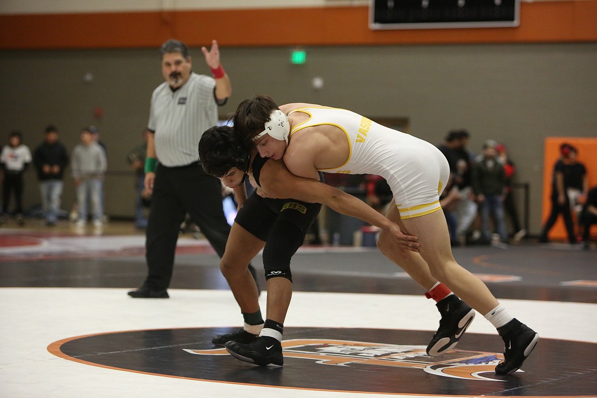 Moses Lake freshman Trenton Vasquez, right, is one of two Maverick freshmen heading to their first state tournament.