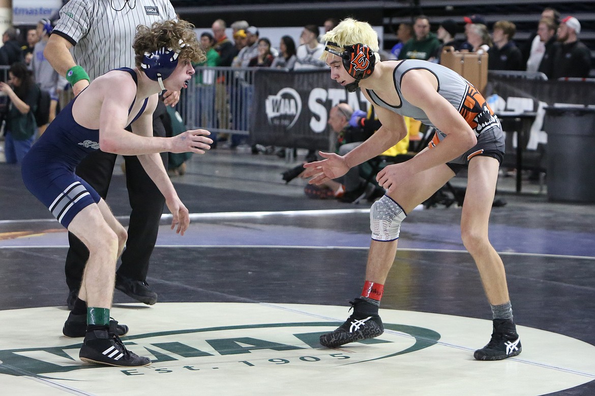 Ephrata senior Zander Boyd, right, wrestles at last year’s Mat Classic in Tacoma. Boyd is now a three-time state qualifier.