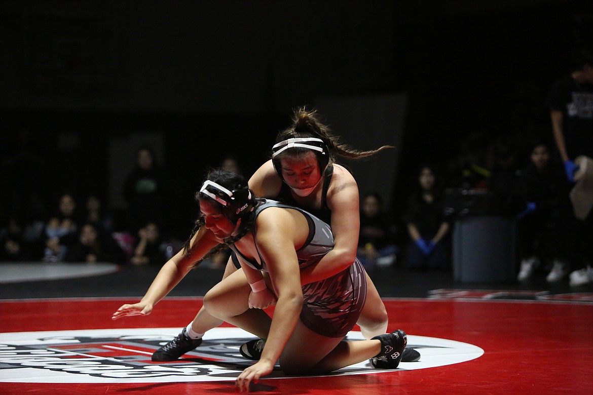 Othello senior Elia Velazquez, top, is Othello’s lone returning state placer from the 2A/1A/B Girls Mat Classic.