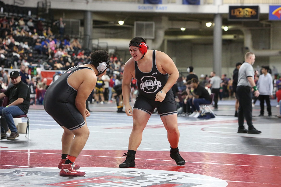 Othello junior Mason Perez, right, is one of 10 Othello boys wrestlers who qualified for the 2A Mat Classic.