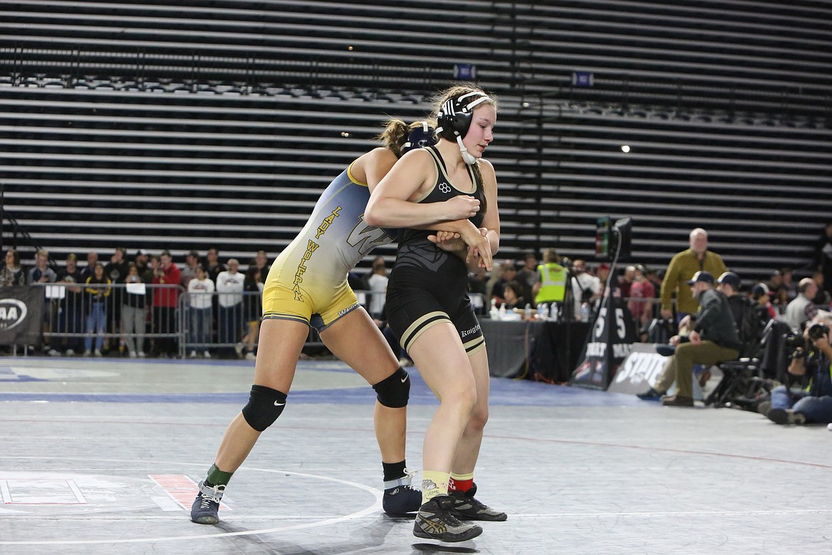 Royal junior Lauren Jenks works to escape at the 2023 Mat Classic.