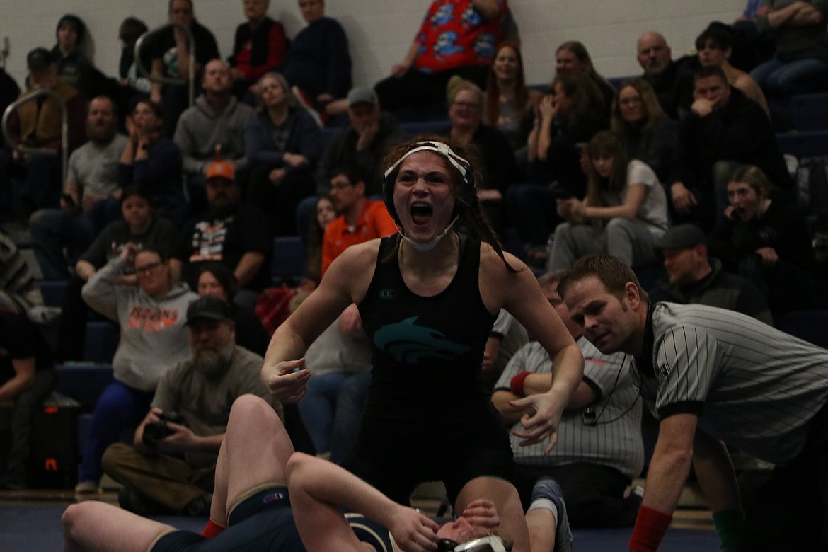 Courtesy photo
Lake City's Madi Cook celebrates after pinning Timberlake's Shelby Garten during the 132-pound finals in the girls District 1-2 tournament on Thursday at Timberlake High.