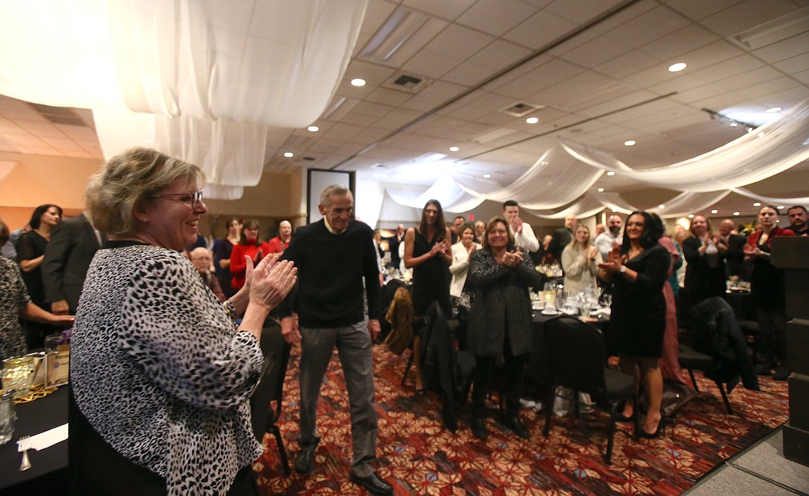 Post Falls Chamber Recognition Gala attendees give a standing ovation to former Post Falls Chamber board president and past Post Falls City Council member Joe Doellefeld, who was honored Thursday evening with the chamber's 2024 Heritage Award. The award is presented to a business or individual
with over a quarter century of impacting the community in a variety of ways.