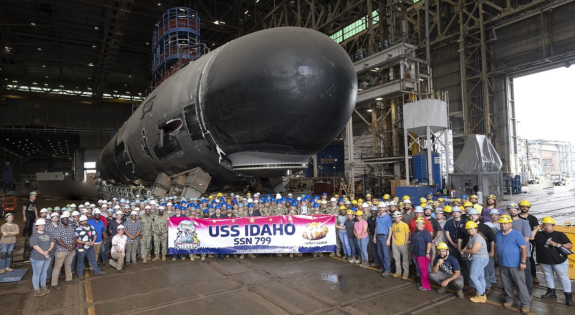 Photo courtesy General Dynamics Electric Boat via the USS IDAHO Commissioning Committee.
The USS IDAHO crew and Electric Boat employees in front of the future USS IDAHO SSN 799 in October 2023.