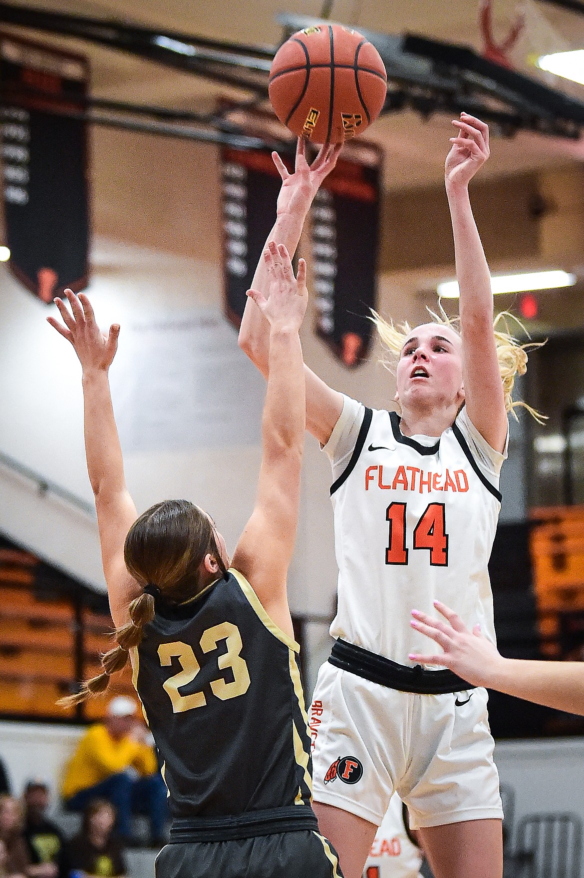 Flathead's Kennedy Moore (14) shoots in the third quarter against Helena Capital at Flathead High School on Friday, Feb. 16. (Casey Kreider/Daily Inter Lake)