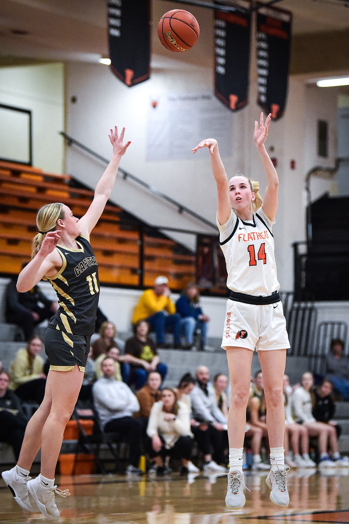 Flathead's Kennedy Moore (14) shoots in the third quarter against Helena Capital at Flathead High School on Friday, Feb. 16. (Casey Kreider/Daily Inter Lake)