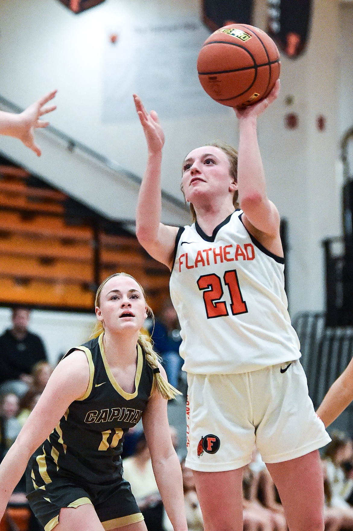 Flathead's Harlie Roth (21) drives to the basket in the third quarter against Helena Capital at Flathead High School on Friday, Feb. 16. (Casey Kreider/Daily Inter Lake)