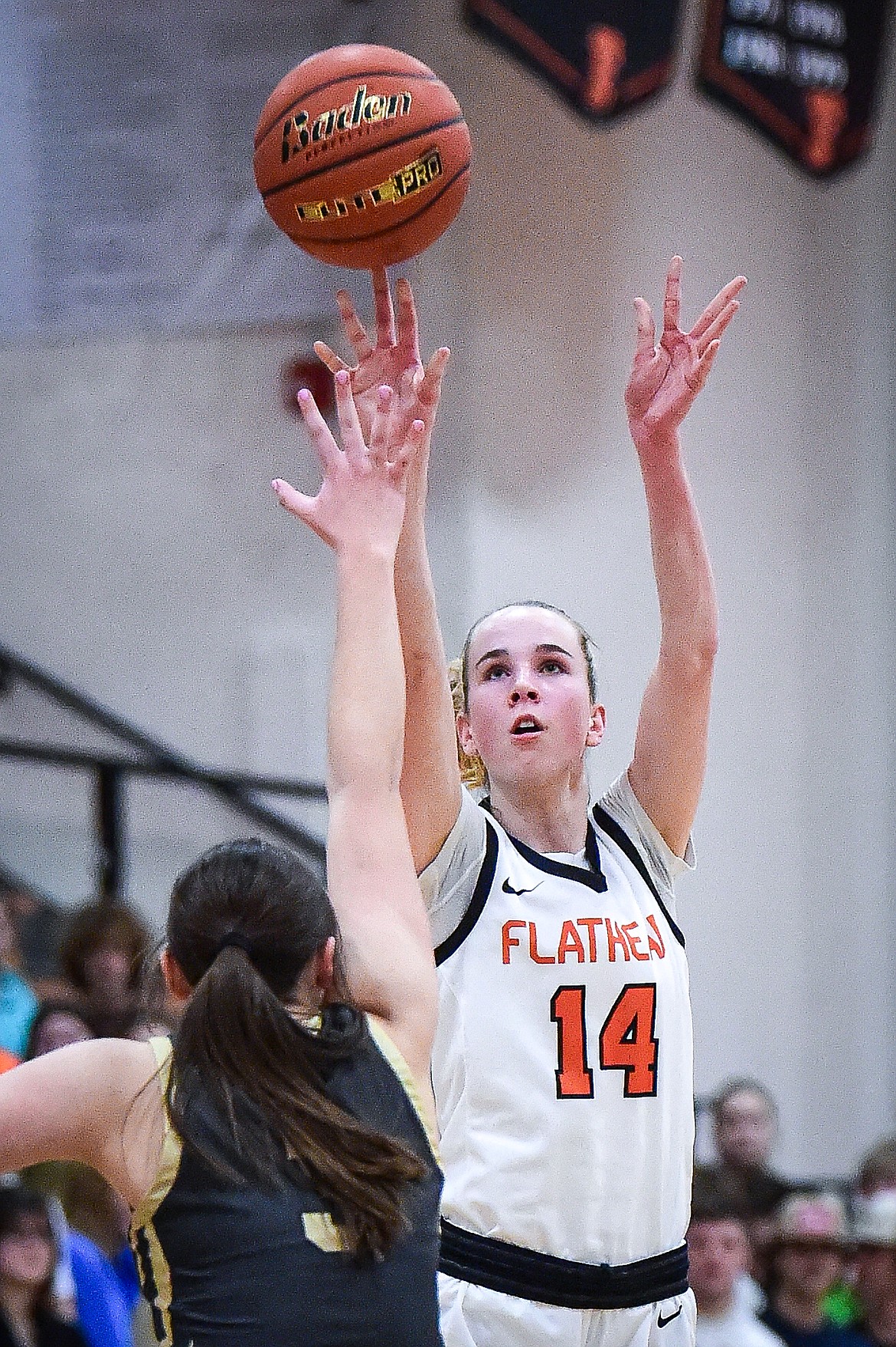 Flathead's Kennedy Moore (14) shoots in the first quarter against Helena Capital at Flathead High School on Friday, Feb. 16. (Casey Kreider/Daily Inter Lake)