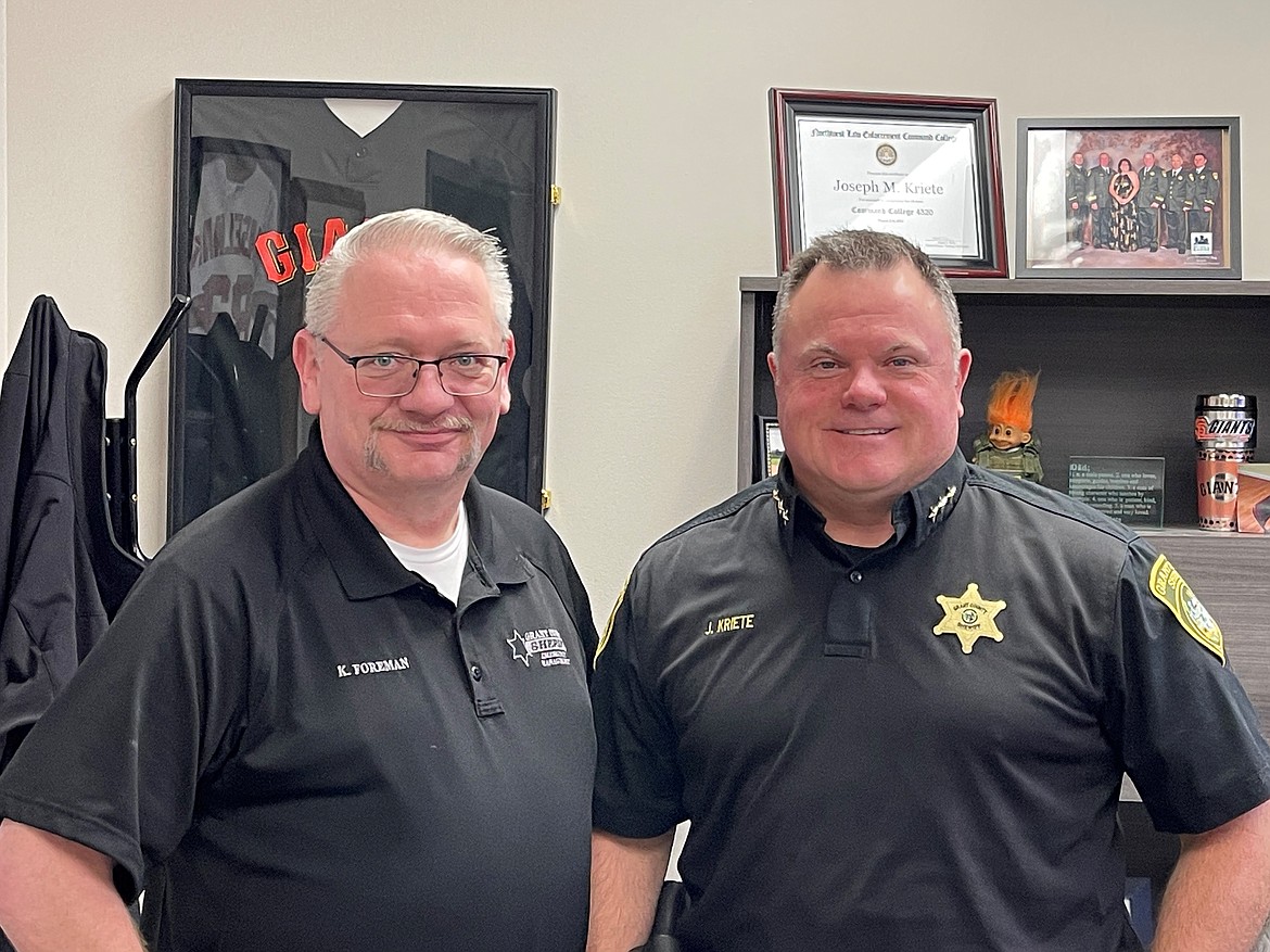 Grant County Sheriff’s Office Public Information Officer Kyle Foreman, left, and Grant County Sheriff Joe Kriete stop for a photo in the Sheriff’s Office. The pair worked together to offer a recap of GCSO’s last year and goals Kriete has set for the department in 2024.