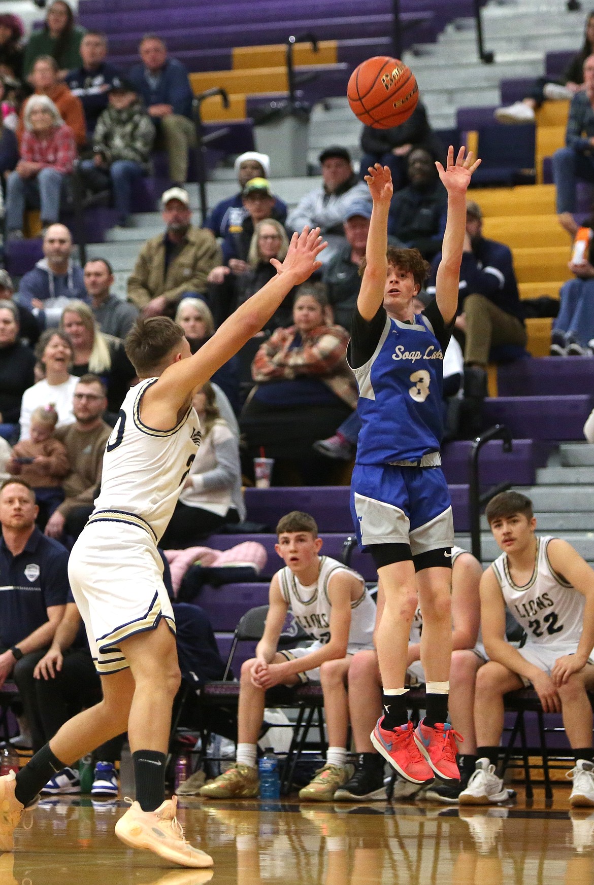 MLCA/CCS senior Jonah Robertson, in white, scored 24 points in Thursday’s 78-45 win over Soap Lake, including hitting five first-quarter three-pointers.