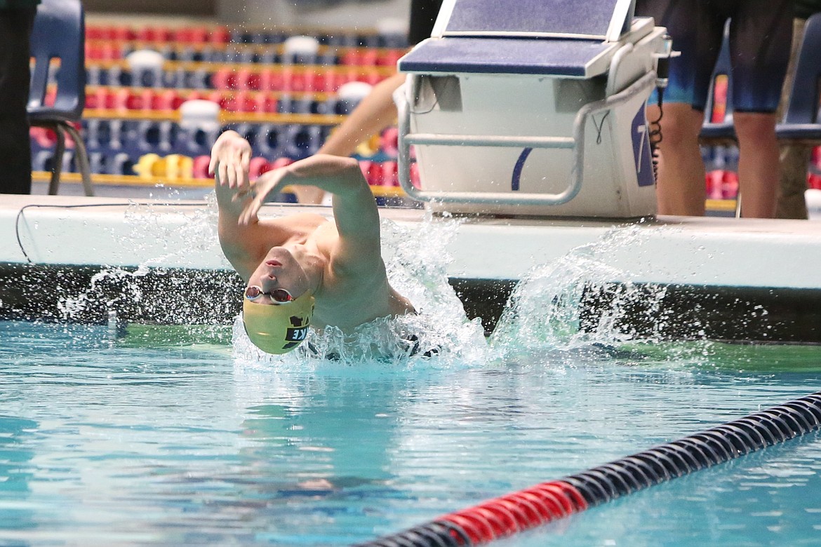 Moses Lake junior Dylan Moore leads off Moses Lake’s 200-yard medley team at the 4A Boys State Swimming and Diving Championships in Federal Way.