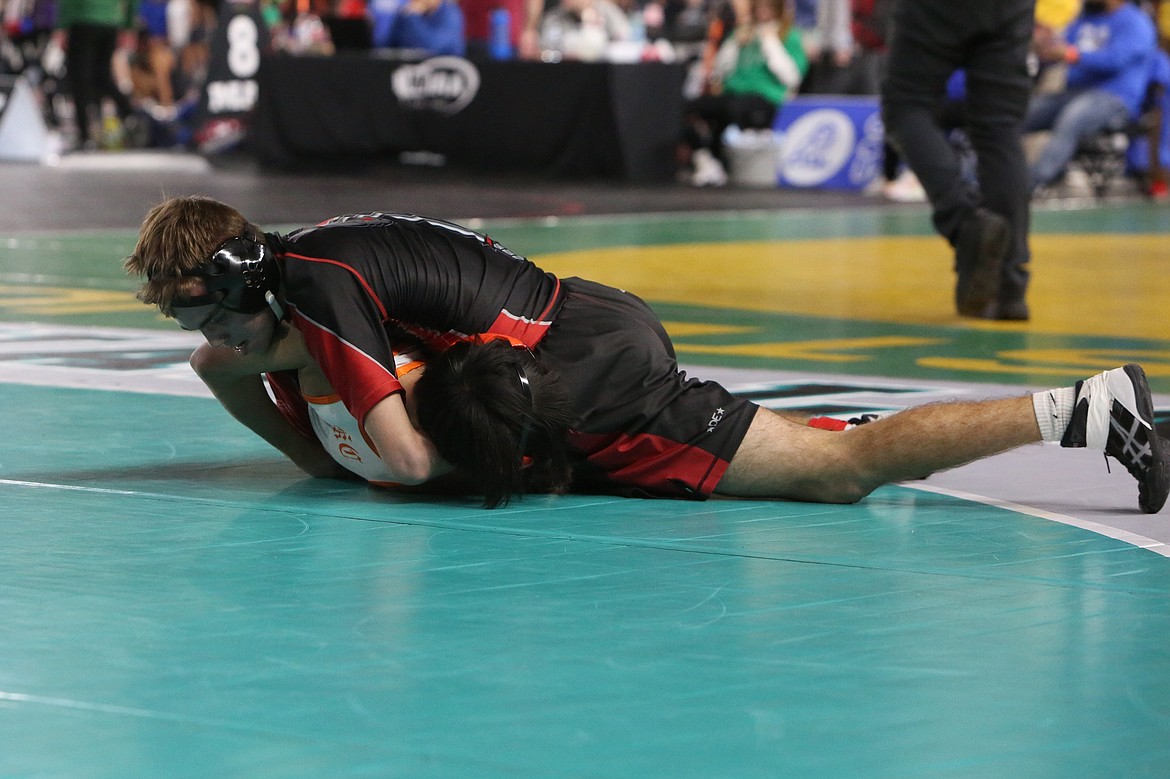 Almira/Coulee-Hartline junior Jack Molitor, top, pins Kalama’s Alex Chao at the 1B/2B Mat Classic.