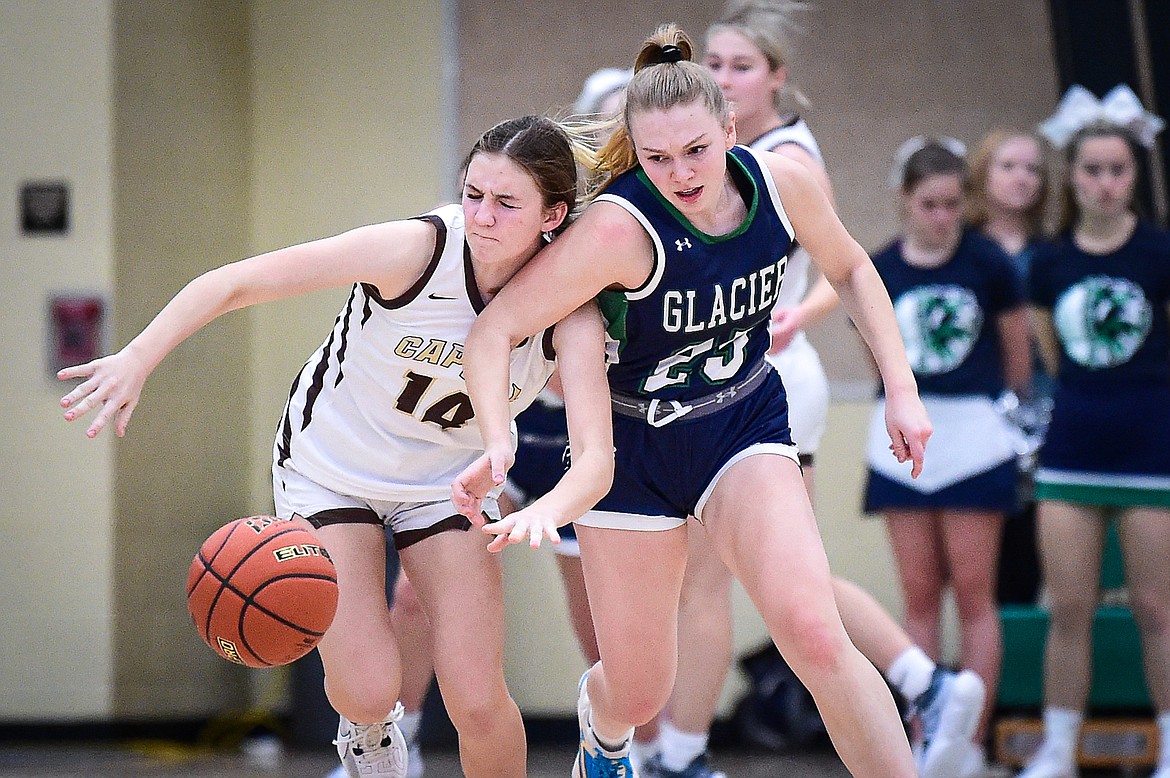 Glacier's Cazzland Rankosky (25) steals the ball from Helena Capital's Madi Emmert (14) in the first half at Glacier High School on Saturday, Feb. 17. (Casey Kreider/Daily Inter Lake)