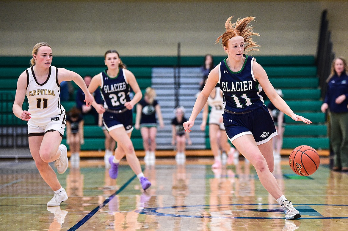 Glacier's Kenedee Moore (11) heads upcourt after a steal in the first quarter against Helena Capital at Glacier High School on Saturday, Feb. 17. (Casey Kreider/Daily Inter Lake)