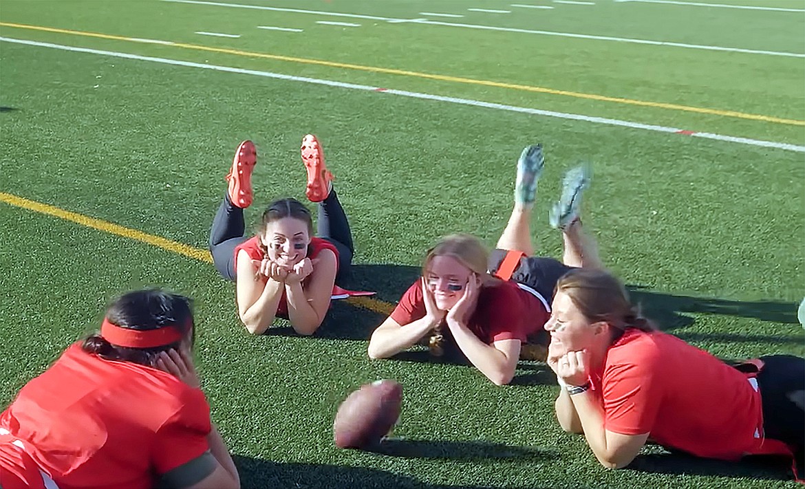 Annaka McClelland is pictured with her flag football teammates in a screenshot of an episode of the web series "Job Hoppers". McClelland encouraged others interested in coding to follow in her footsteps, saying the field's number of coding languages and endless possibilities are idea for those who love learning new things and finding solutions.